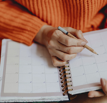 Student holding calendar 