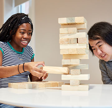 Students playing Giant Jenga.