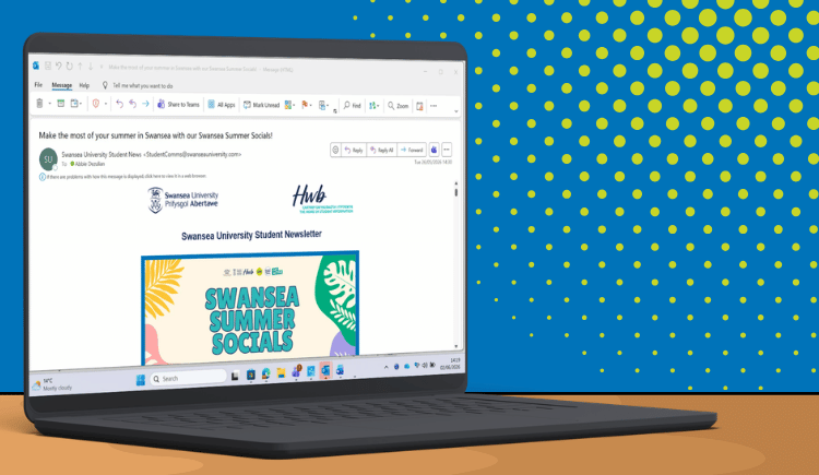 Newsletter on computer screen. Blue background.