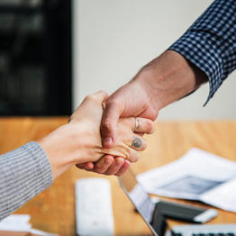 Close up of two people shaking hands