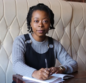 female student sat at desk