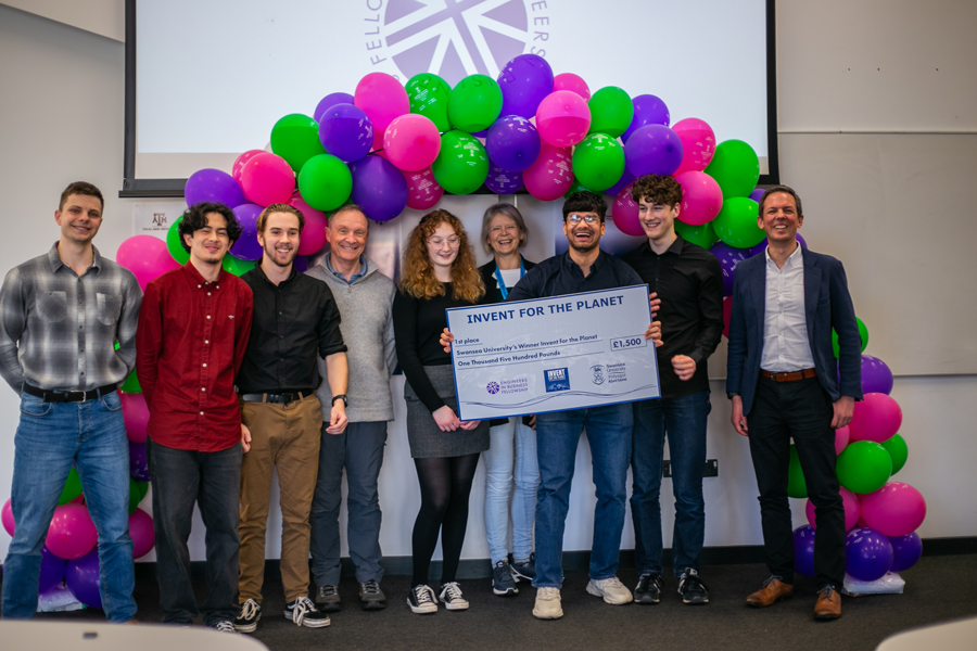 group of students holding award