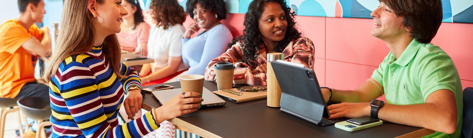 Students Talking by Table Singleton