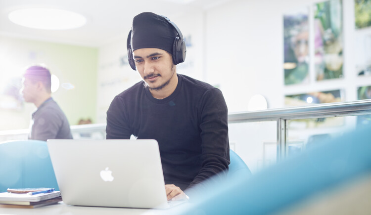 Student working on a laptop