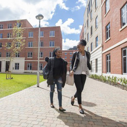 Students walking through Bay Campus