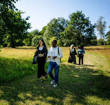 students walking in Singleton Park 