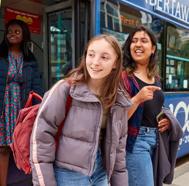 Student leaving First Cymru bus